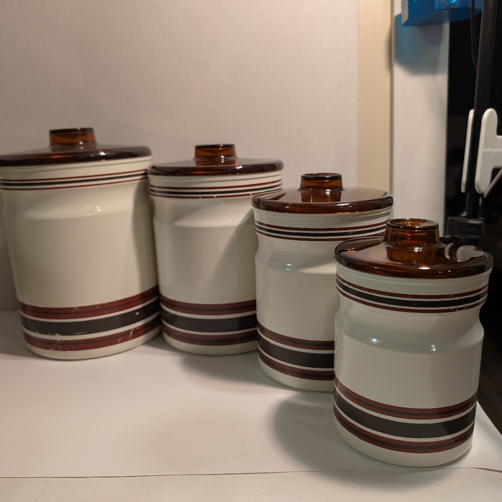 A set of 4 vintage Kromex aluminum kitchen canisters